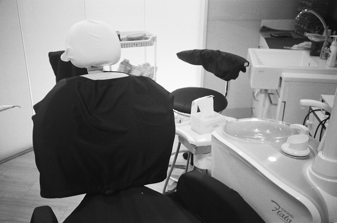 dental cleanings patient in dental chair receiving professional cleaning