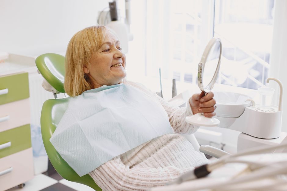 anchored dentures patient smiling